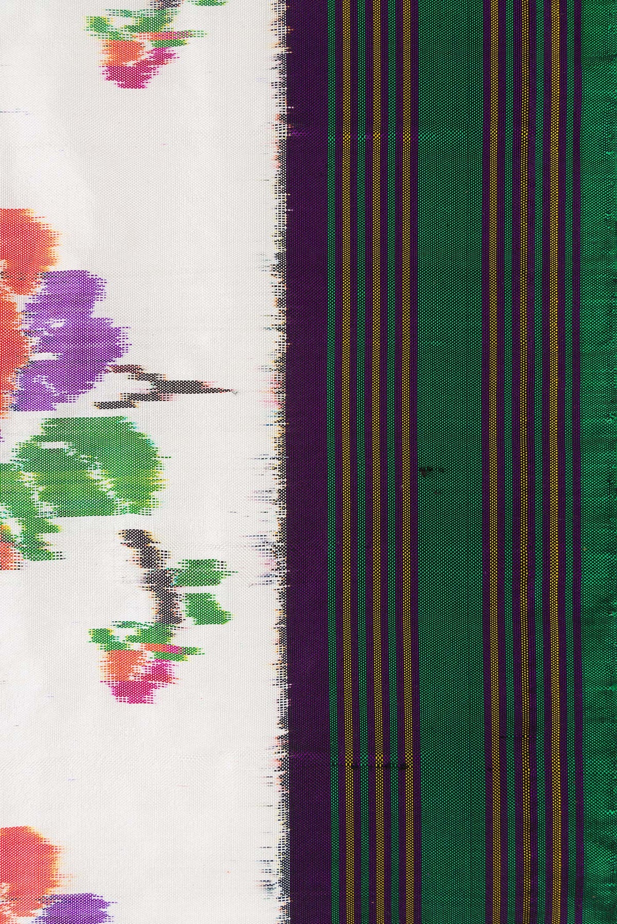 Border image of Off White Dual Tone Double Ikat Saree with Ikat Print on the body and Zari Border. 