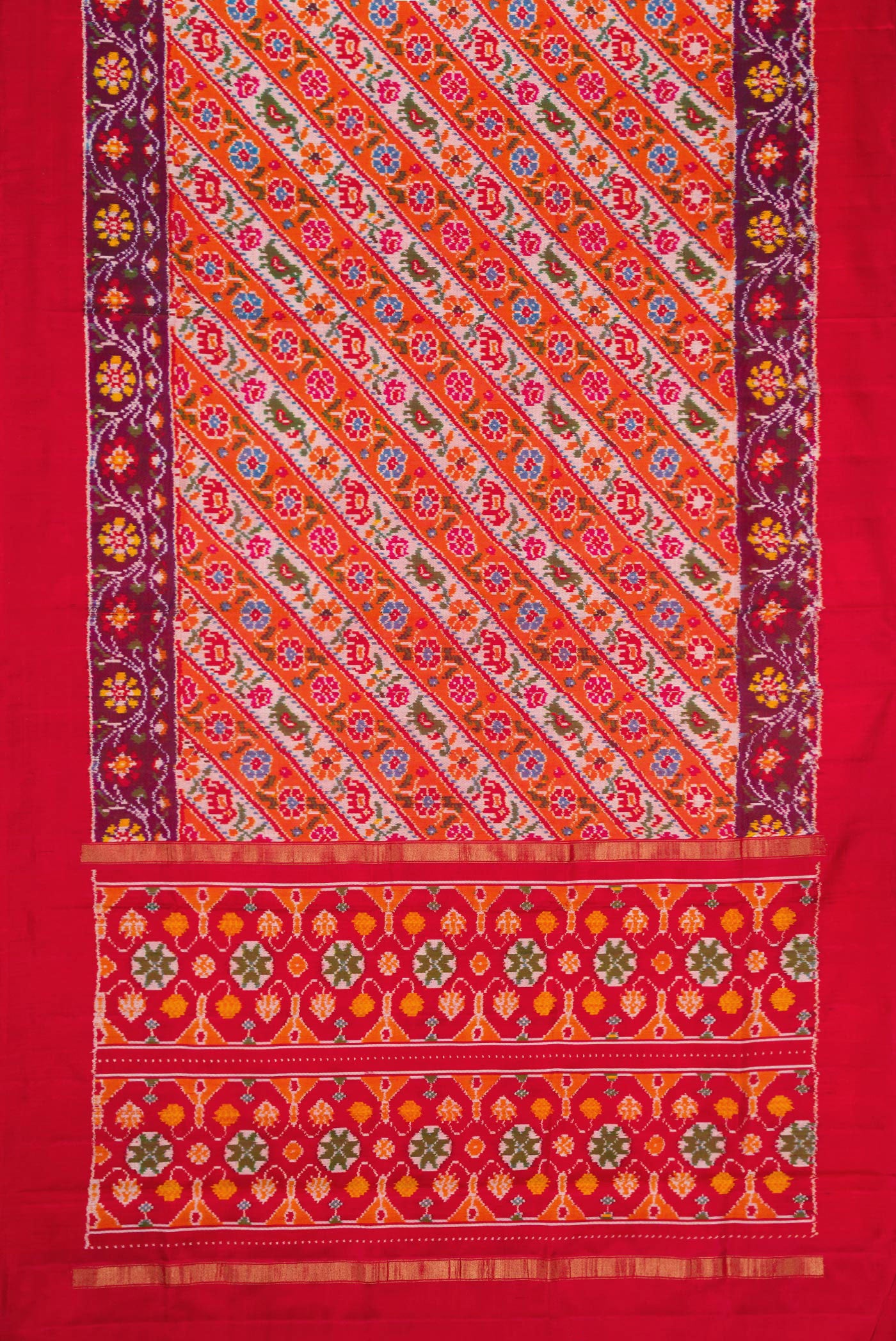 Flat view of Brick Orange Dual Tone Double Ikat Saree with Ikat Print on the body and Ikat Border. 
