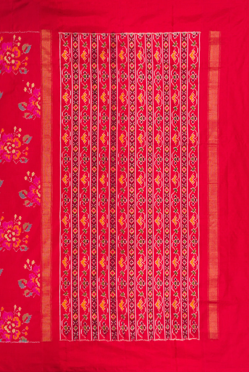 Close up image of the pallu of Red Dual Tone Double Ikat Saree with Ikat Print on the body and Zari Border. 