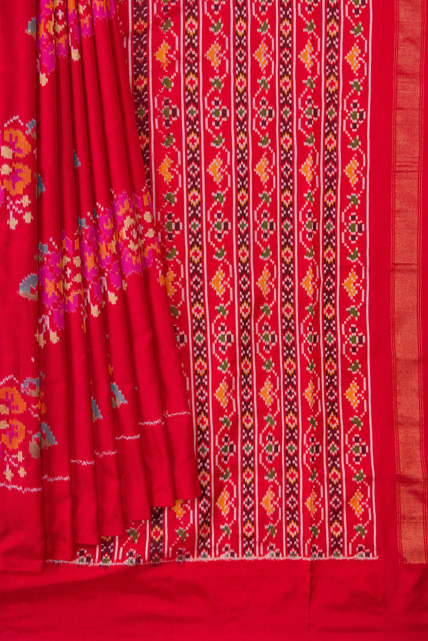 Pleats and pallu of Red Dual Tone Double Ikat Saree with Ikat Print on the body and Zari Border. 