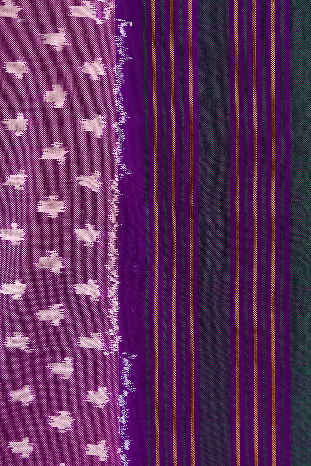 Border image of Purple Dual Tone Double Ikat Saree with Ikat Print on the body and Thread Border. 