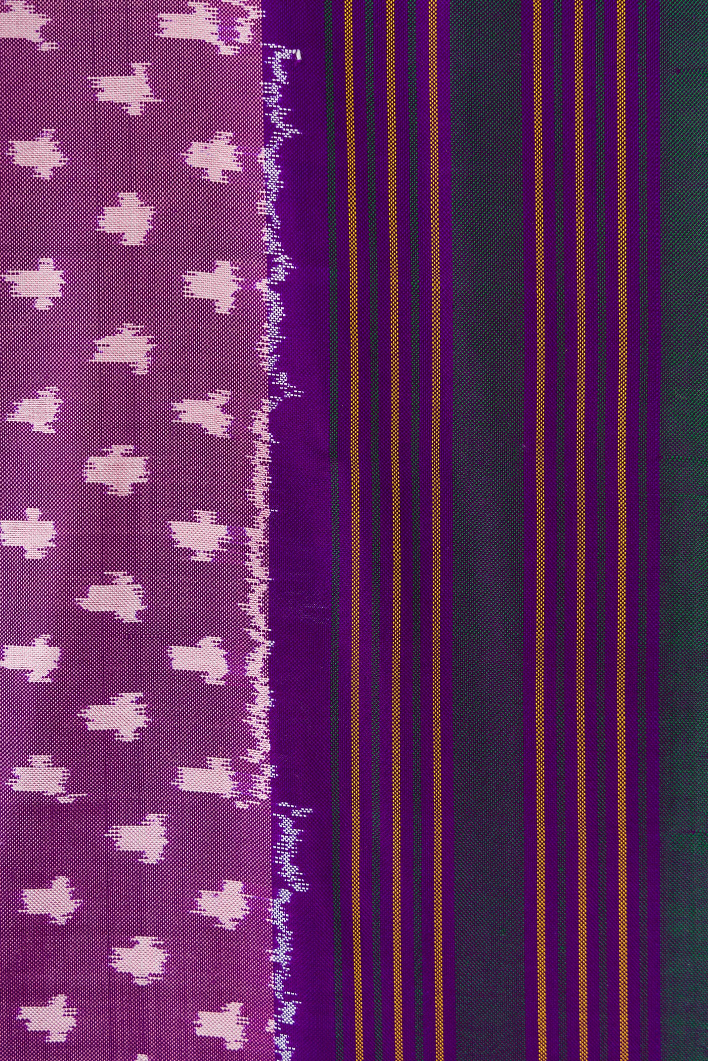 Border image of Purple Dual Tone Double Ikat Saree with Ikat Print on the body and Thread Border. 
