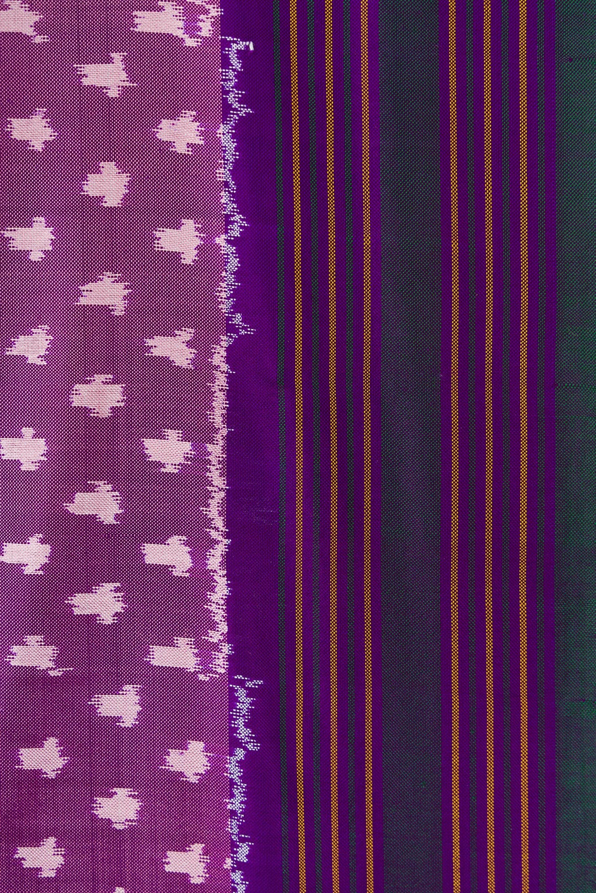 Border image of Purple Dual Tone Double Ikat Saree with Ikat Print on the body and Thread Border. 