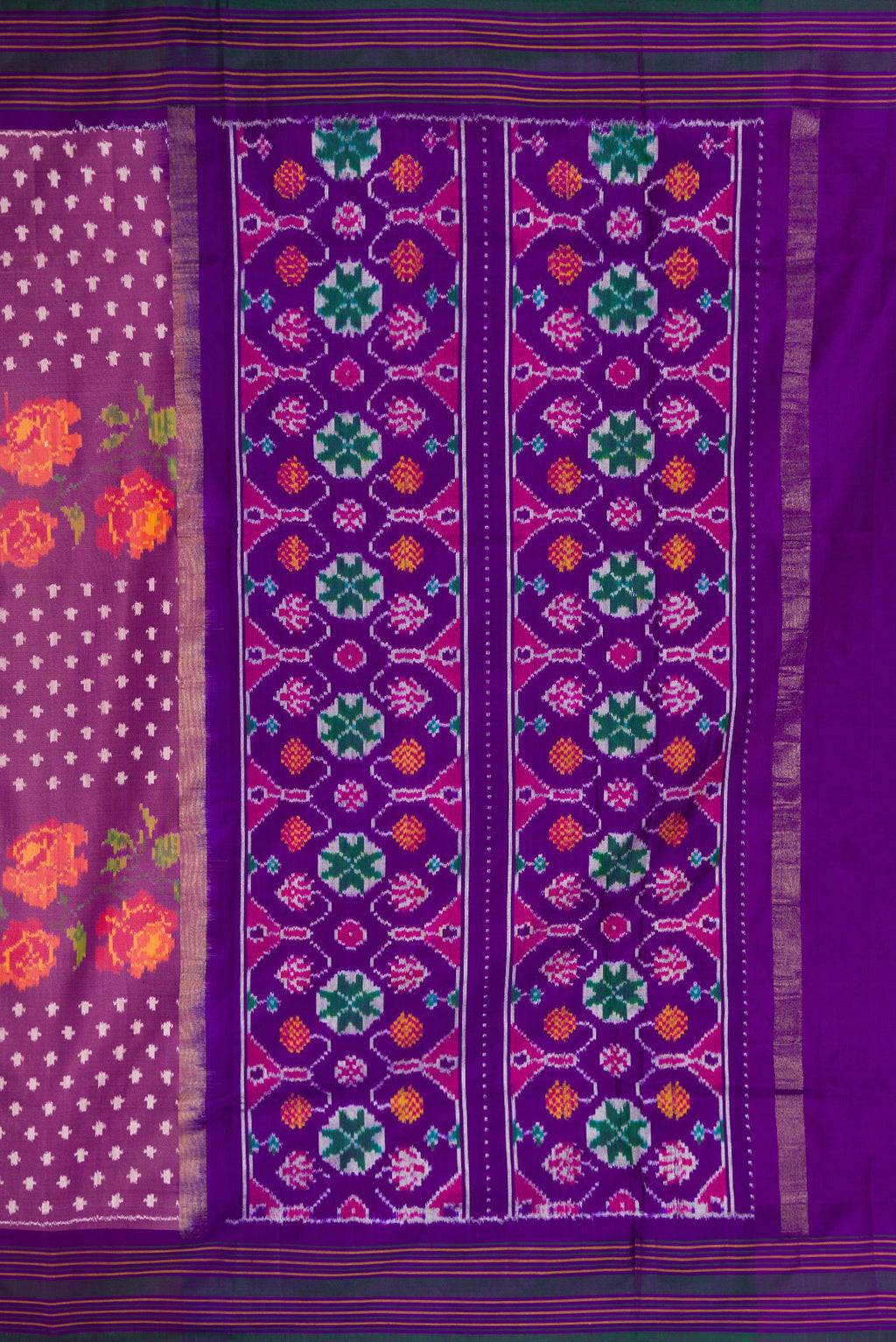 Close up image of the pallu of Purple Dual Tone Double Ikat Saree with Ikat Print on the body and Thread Border. 