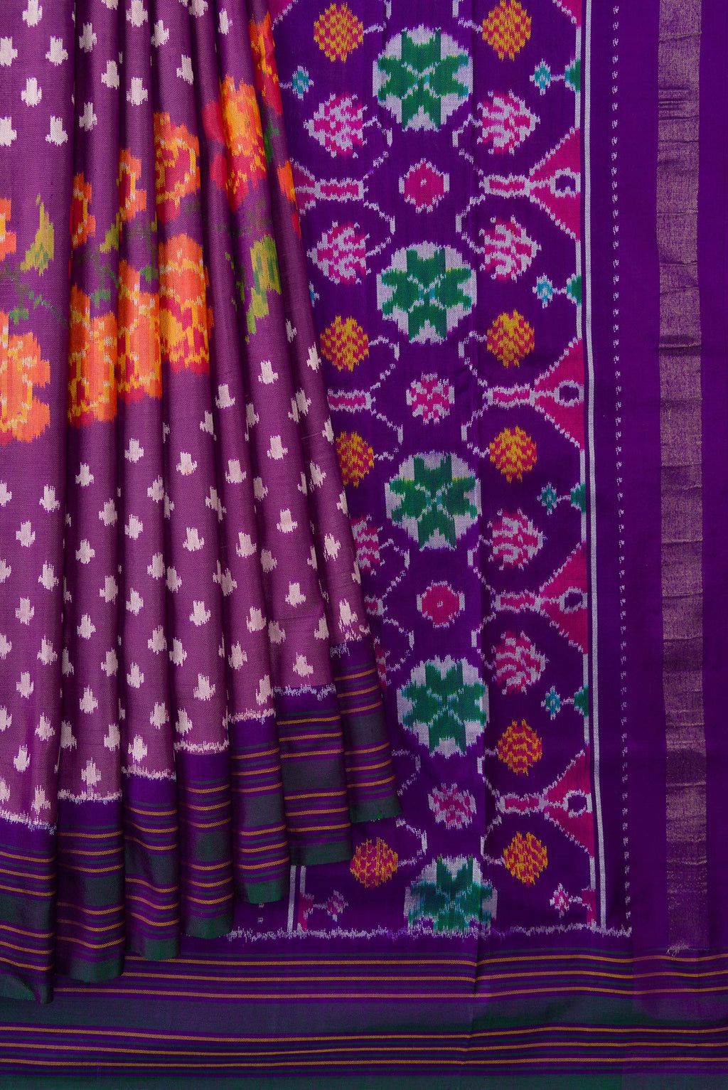 Pleats and pallu of Purple Dual Tone Double Ikat Saree with Ikat Print on the body and Thread Border. 