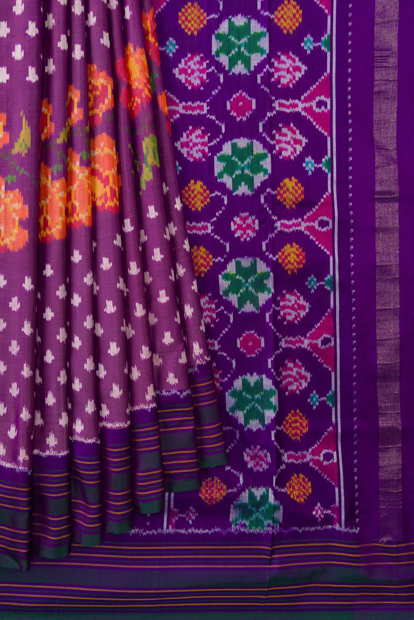 Pleats and pallu of Purple Dual Tone Double Ikat Saree with Ikat Print on the body and Thread Border. 