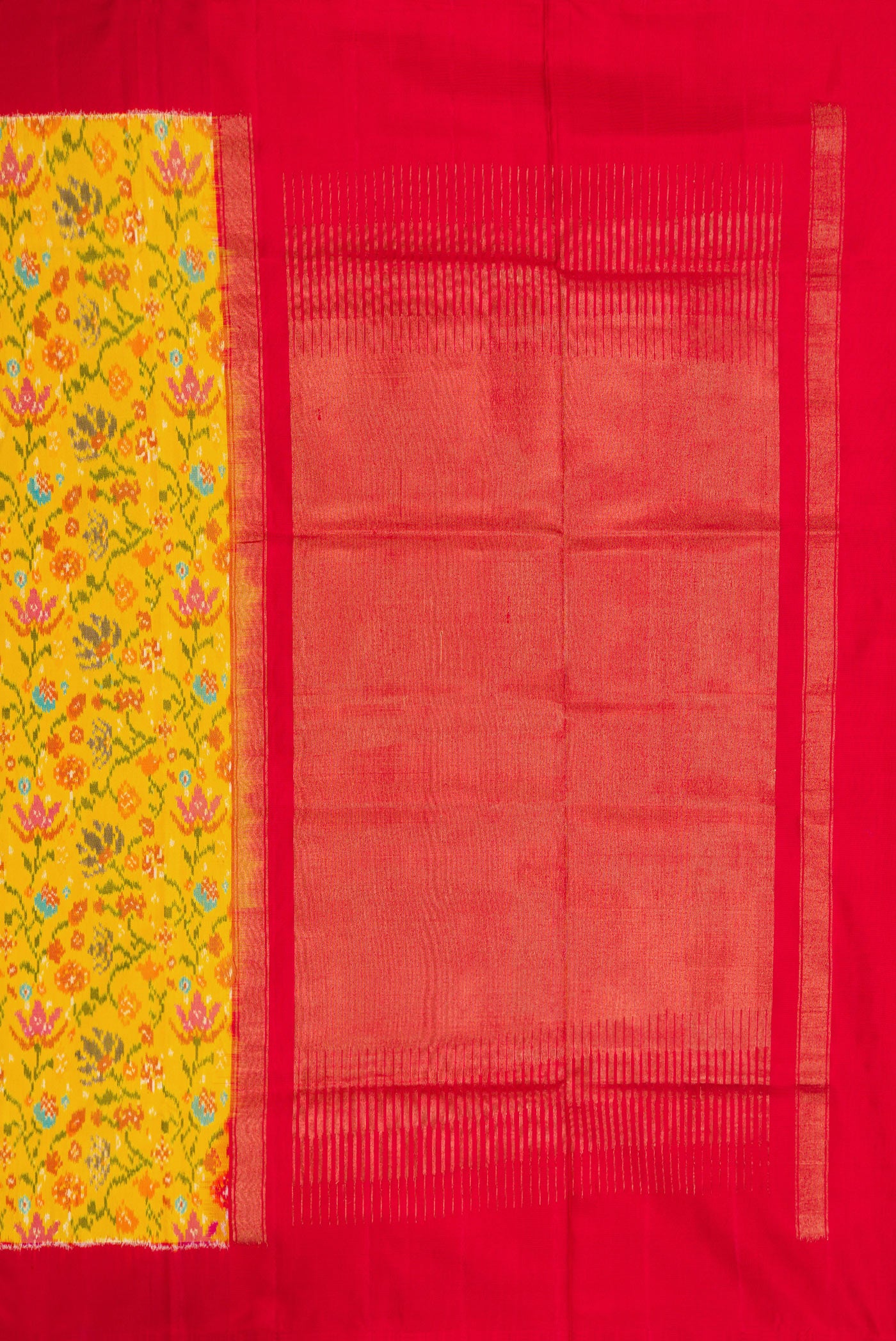 Close up image of the pallu of Yellow Dual Tone Double Ikat Saree with Ikat Print on the body and Plain Border. 