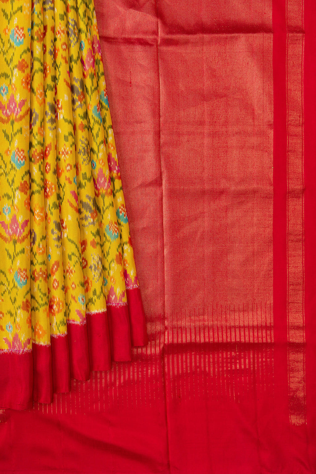 Pleats and pallu of Yellow Dual Tone Double Ikat Saree with Ikat Print on the body and Plain Border. 
