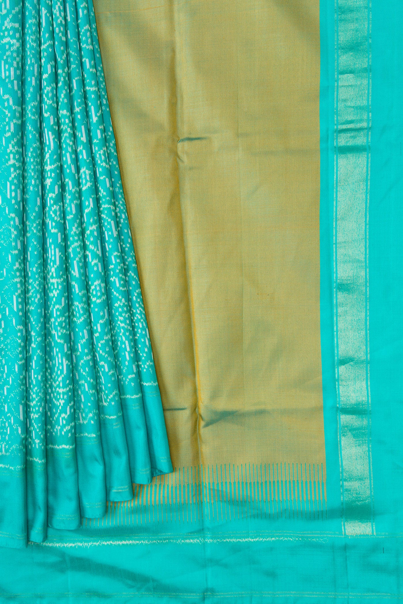 Pleats and pallu of Sea Green Dual Tone Double Ikat Saree with Ikat Print on the body and Zari Border. 