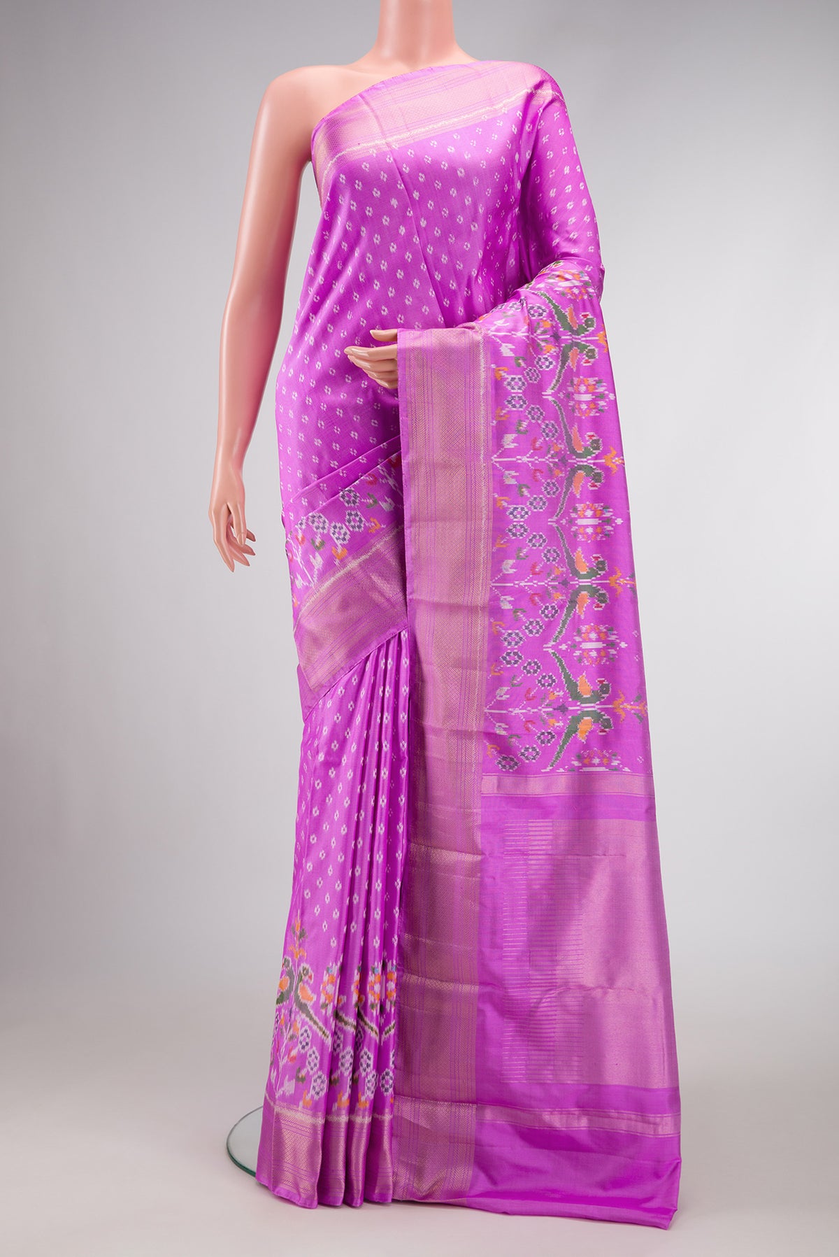 Pink Dual Tone Double Ikat Saree with Ikat Print on the body and Ikat Border.  displayed on a mannequin