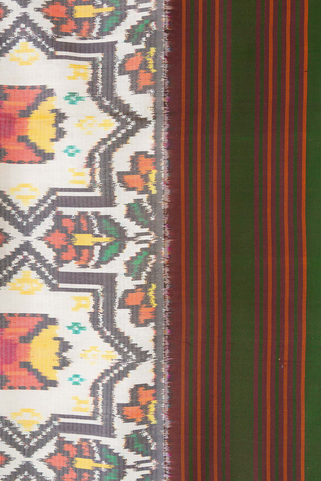 Border image of Beige Dual Tone Double Ikat Saree with Ikat Print on the body and Thread Border. 
