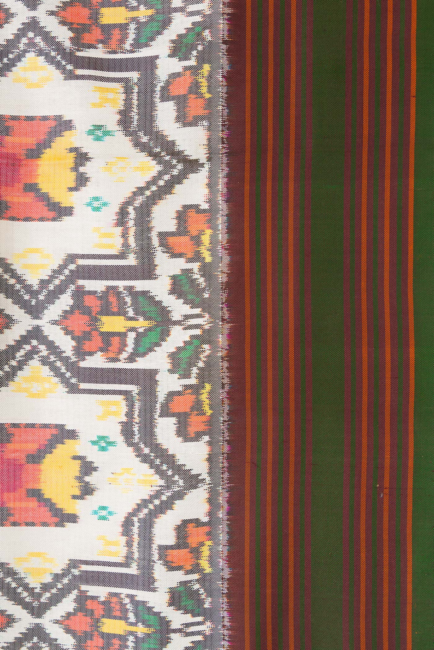 Border image of Beige Dual Tone Double Ikat Saree with Ikat Print on the body and Thread Border. 