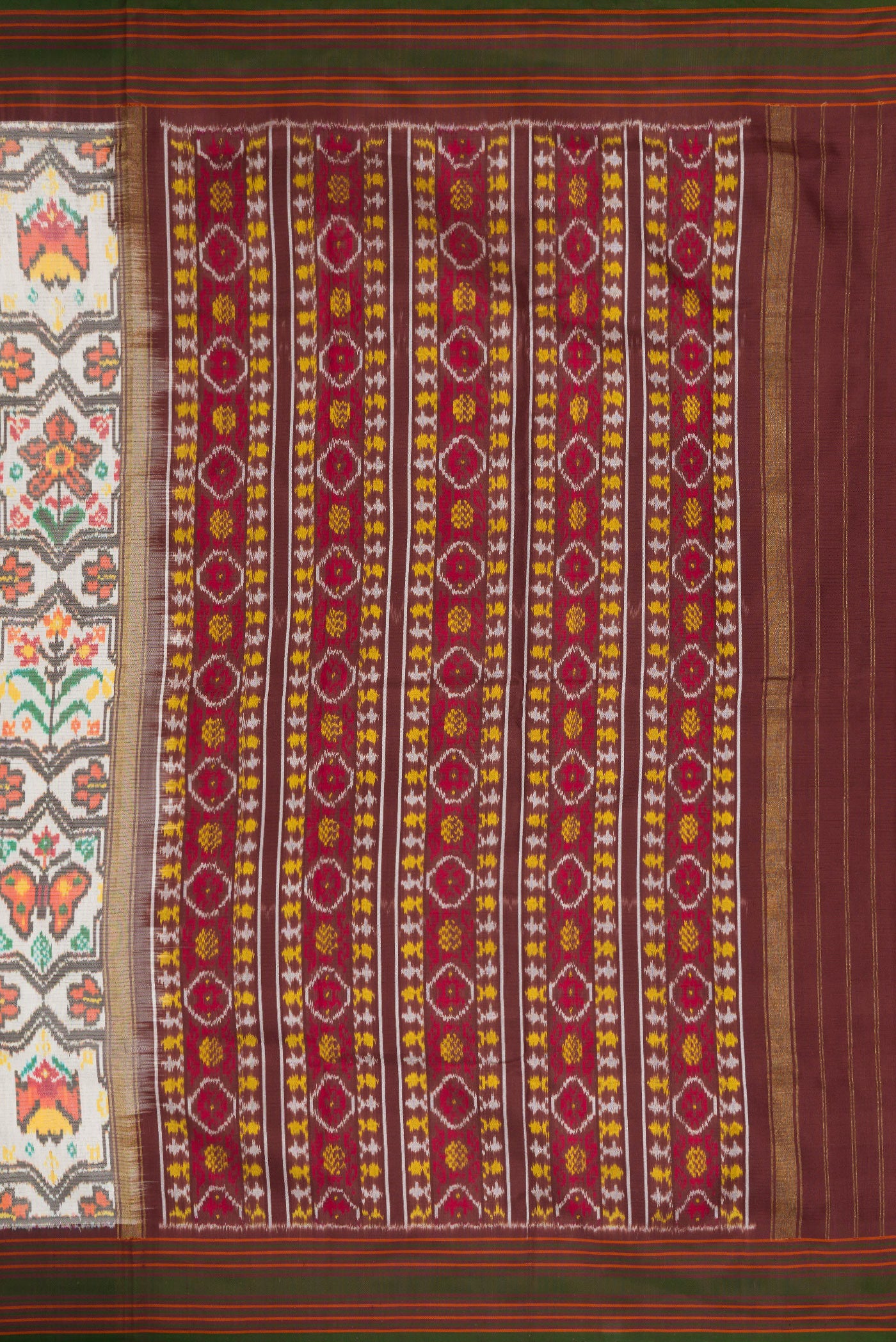 Close up image of the pallu of Beige Dual Tone Double Ikat Saree with Ikat Print on the body and Thread Border. 