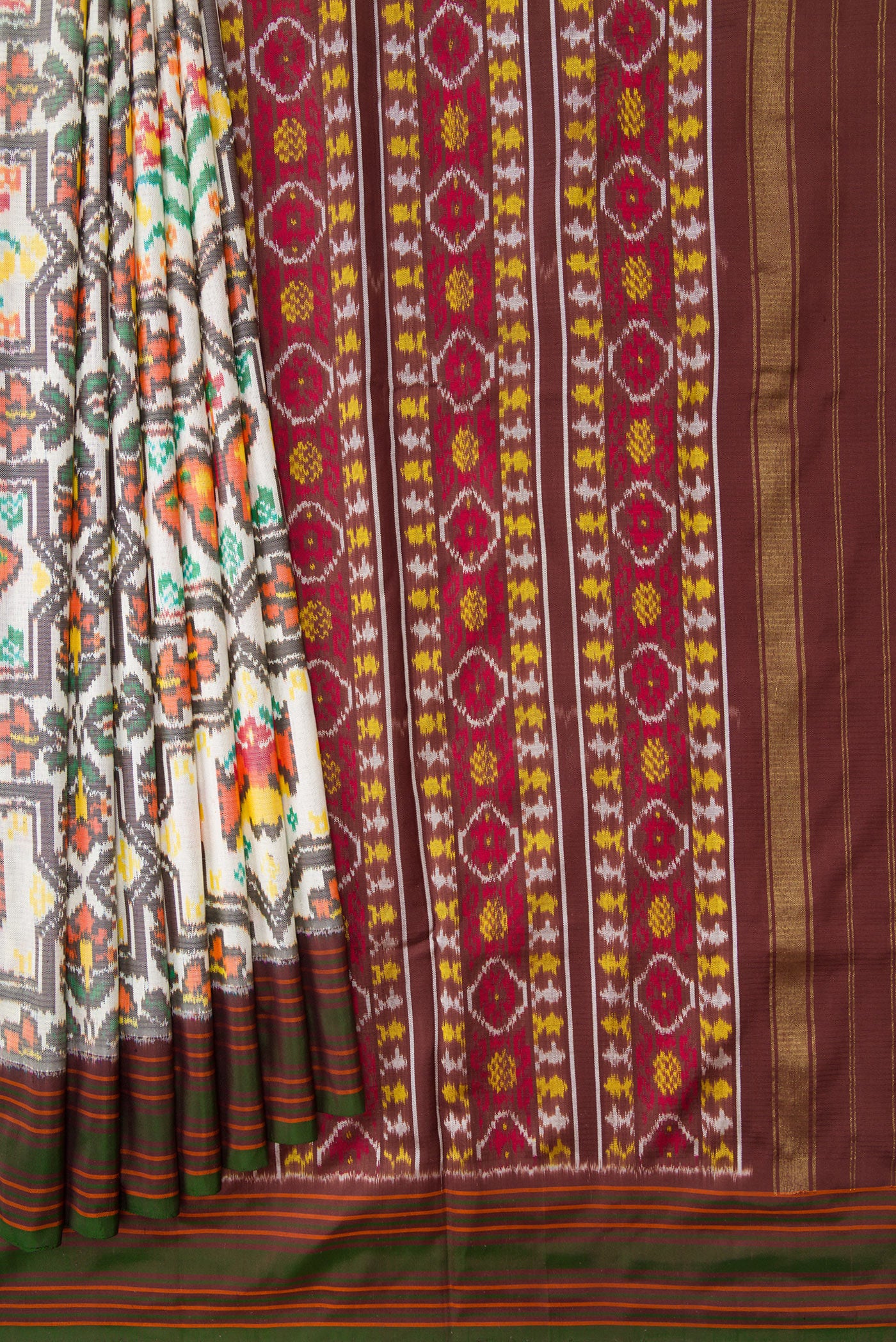 Pleats and pallu of Beige Dual Tone Double Ikat Saree with Ikat Print on the body and Thread Border. 