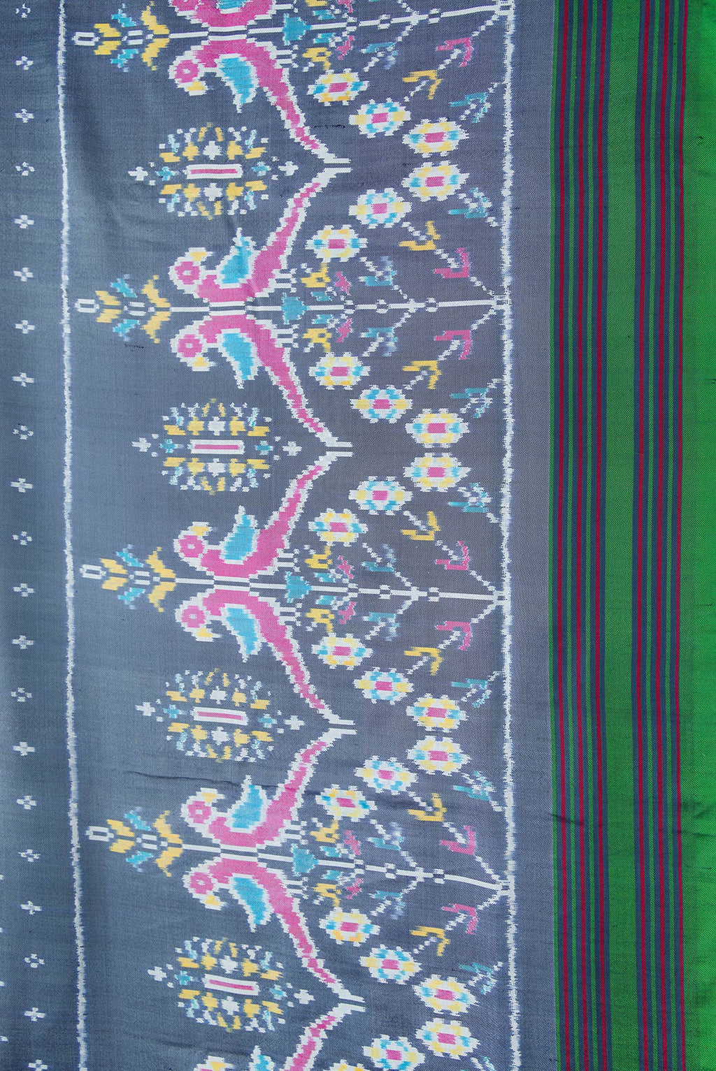 Border image of Grey Dual Tone Double Ikat Saree with Ikat Print on the body and Ikat Border. 
