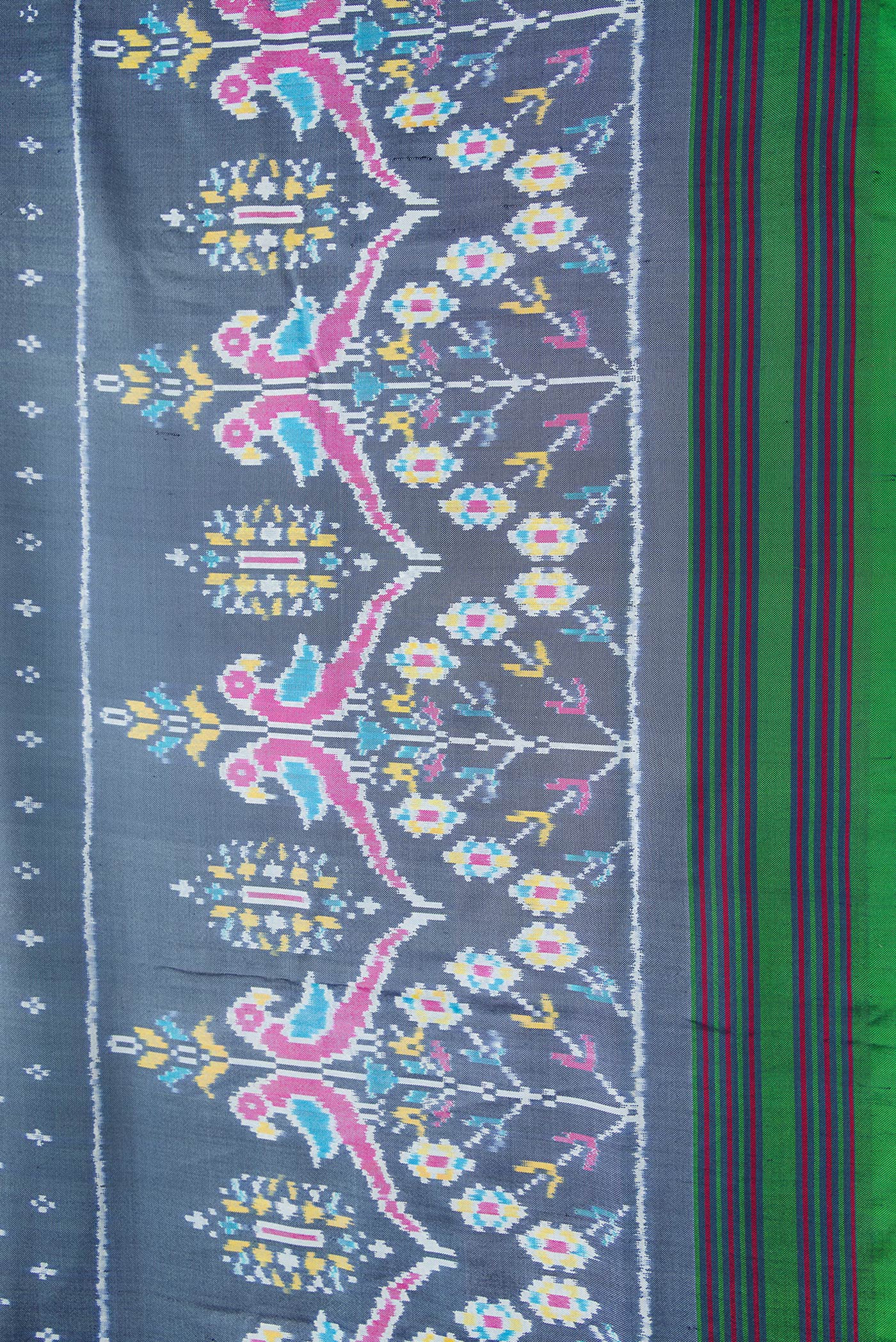 Border image of Grey Dual Tone Double Ikat Saree with Ikat Print on the body and Ikat Border. 
