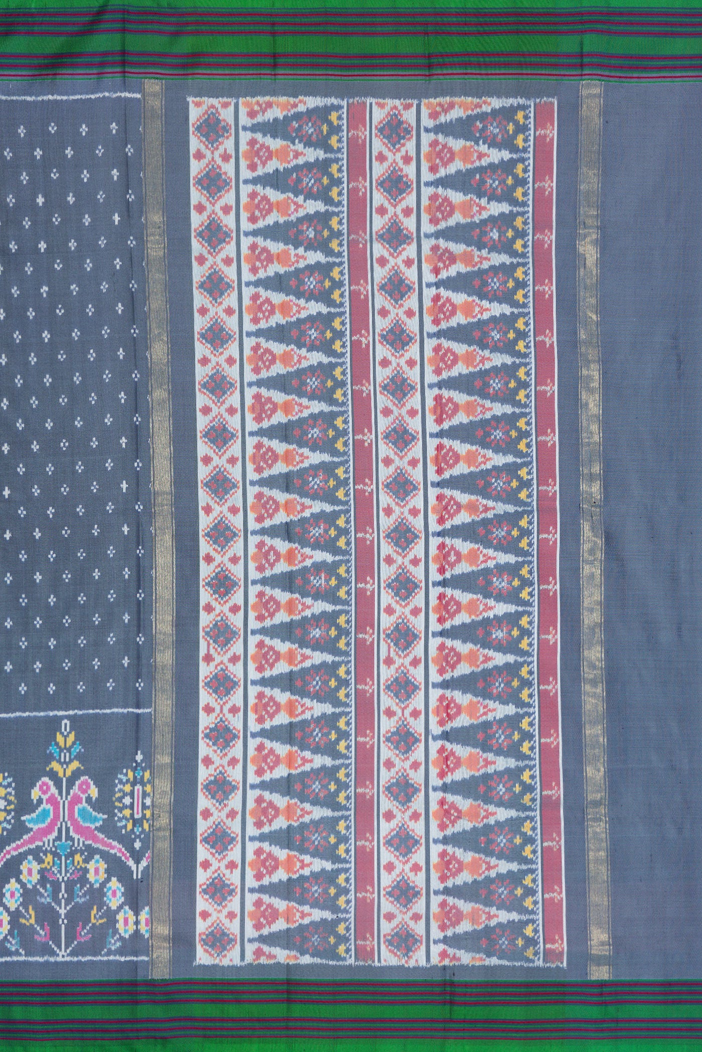 Close up image of the pallu of Grey Dual Tone Double Ikat Saree with Ikat Print on the body and Ikat Border. 