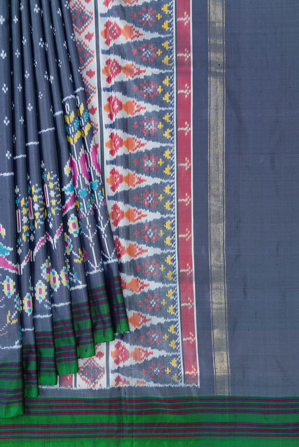 Pleats and pallu of Grey Dual Tone Double Ikat Saree with Ikat Print on the body and Ikat Border. 