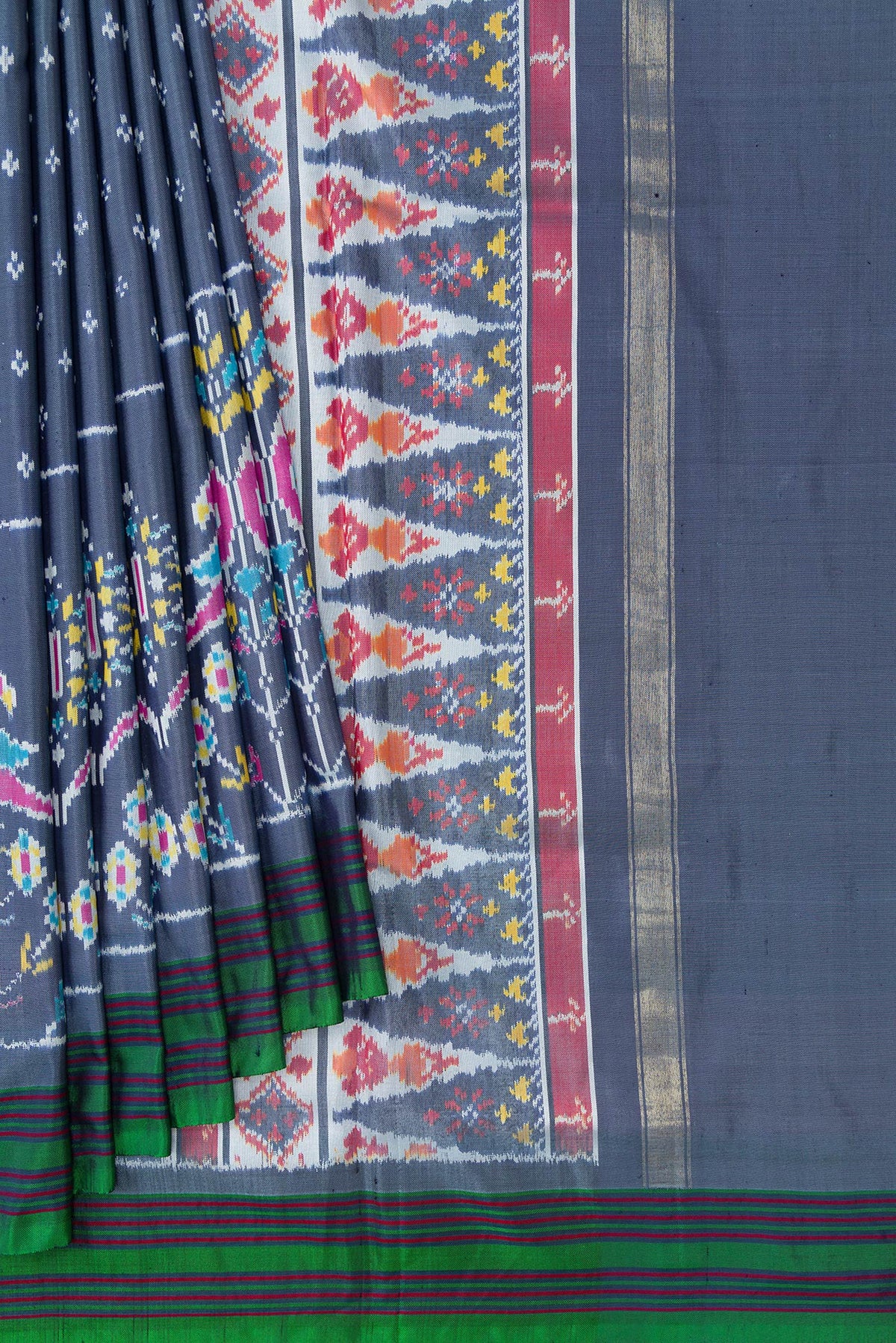 Pleats and pallu of Grey Dual Tone Double Ikat Saree with Ikat Print on the body and Ikat Border. 