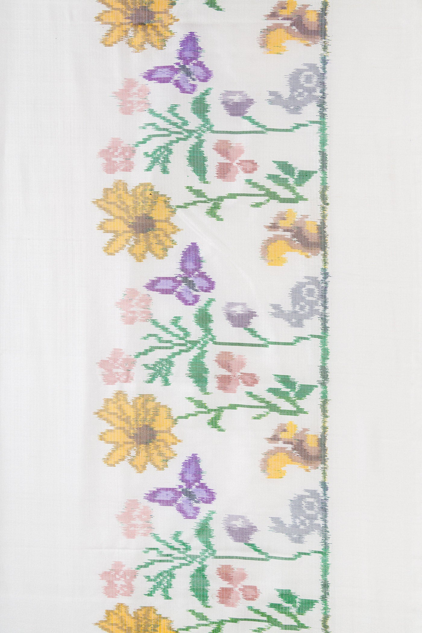 Border image of Off White Dual Tone Double Ikat Saree with Plain Body and Ikat Border. 