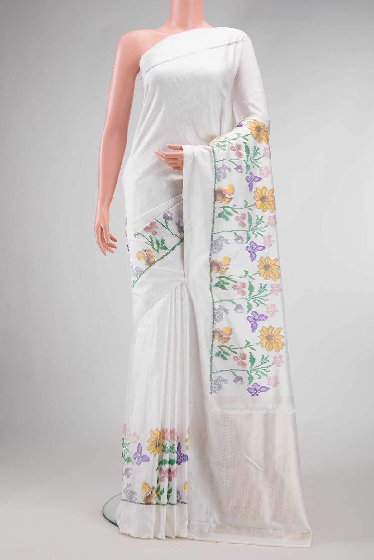 Off White Dual Tone Double Ikat Saree with Plain Body and Ikat Border.  displayed on a mannequin