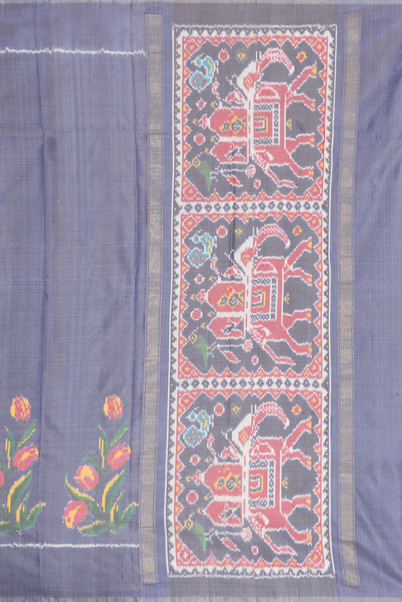 Close up image of the pallu of Grey Dual Tone Double Ikat Saree with Plain Body and Fancy Border. 