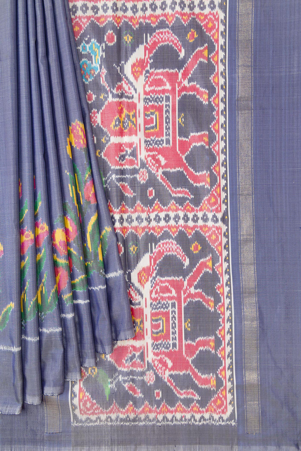 Pleats and pallu of Grey Dual Tone Double Ikat Saree with Plain Body and Fancy Border. 