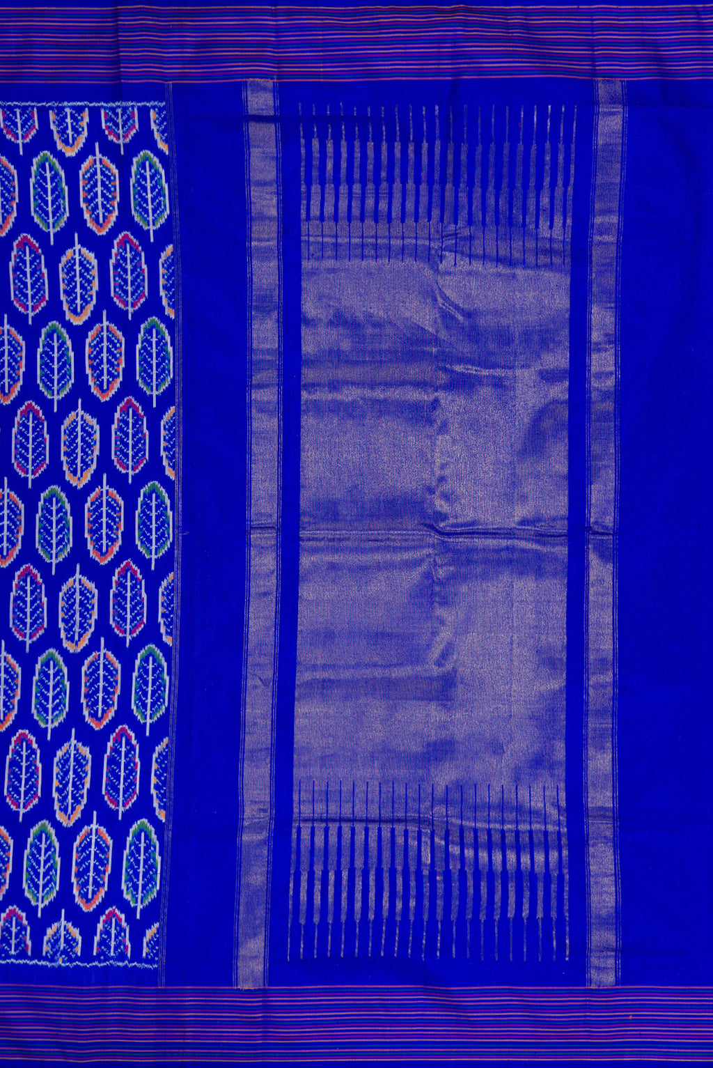 Close up image of the pallu of Royal Blue Dual Tone Double Ikat Saree with Ikat Print on the body and Thread Border. 