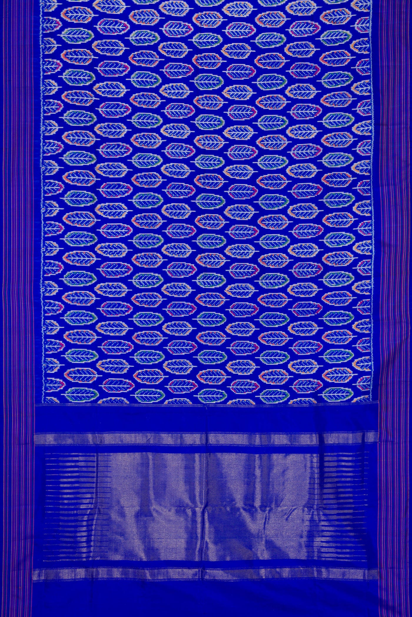 Flat view of Royal Blue Dual Tone Double Ikat Saree with Ikat Print on the body and Thread Border. 