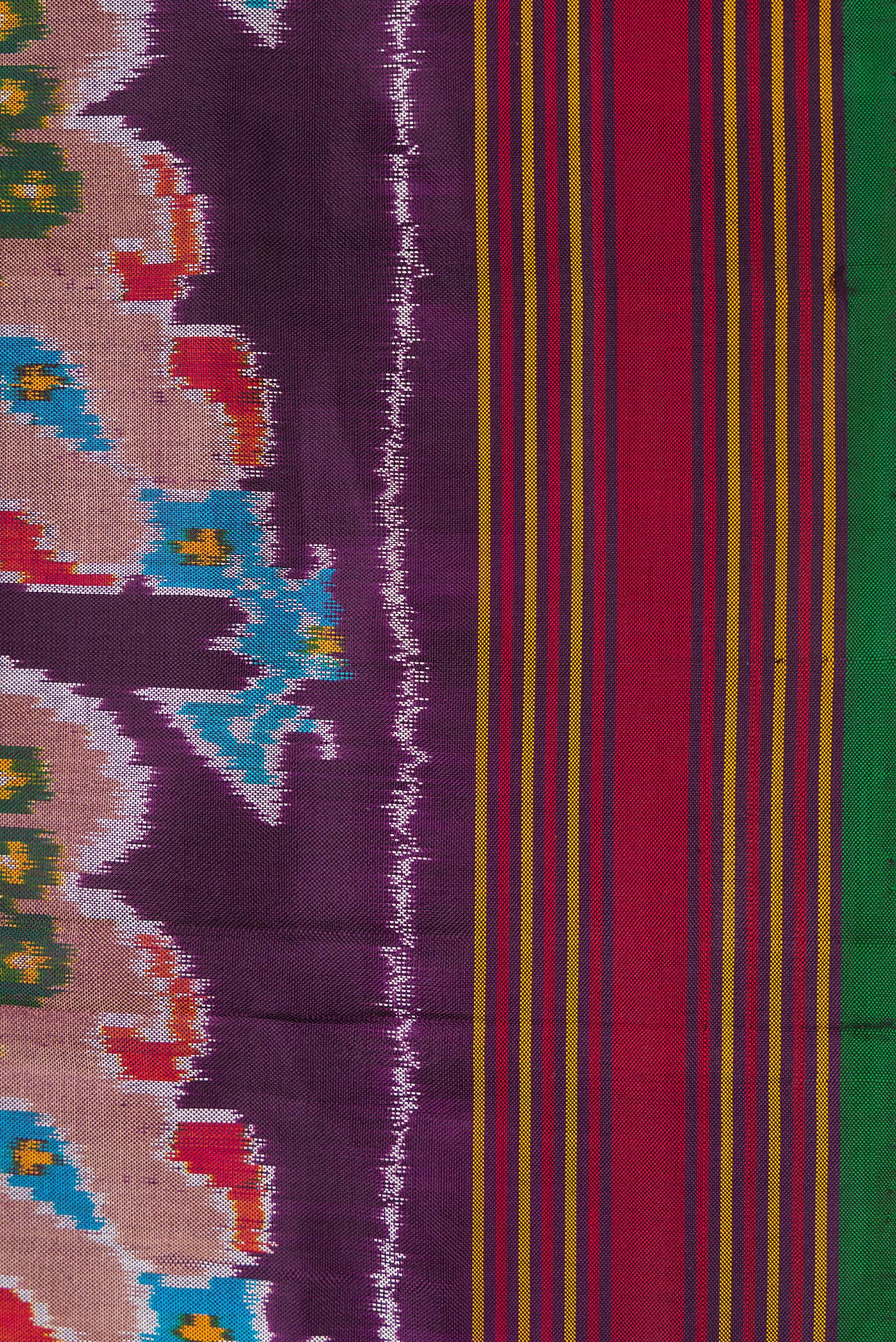 Border image of Burgundy Dual Tone Double Ikat Saree with Ikat Print on the body and Thread Border. 