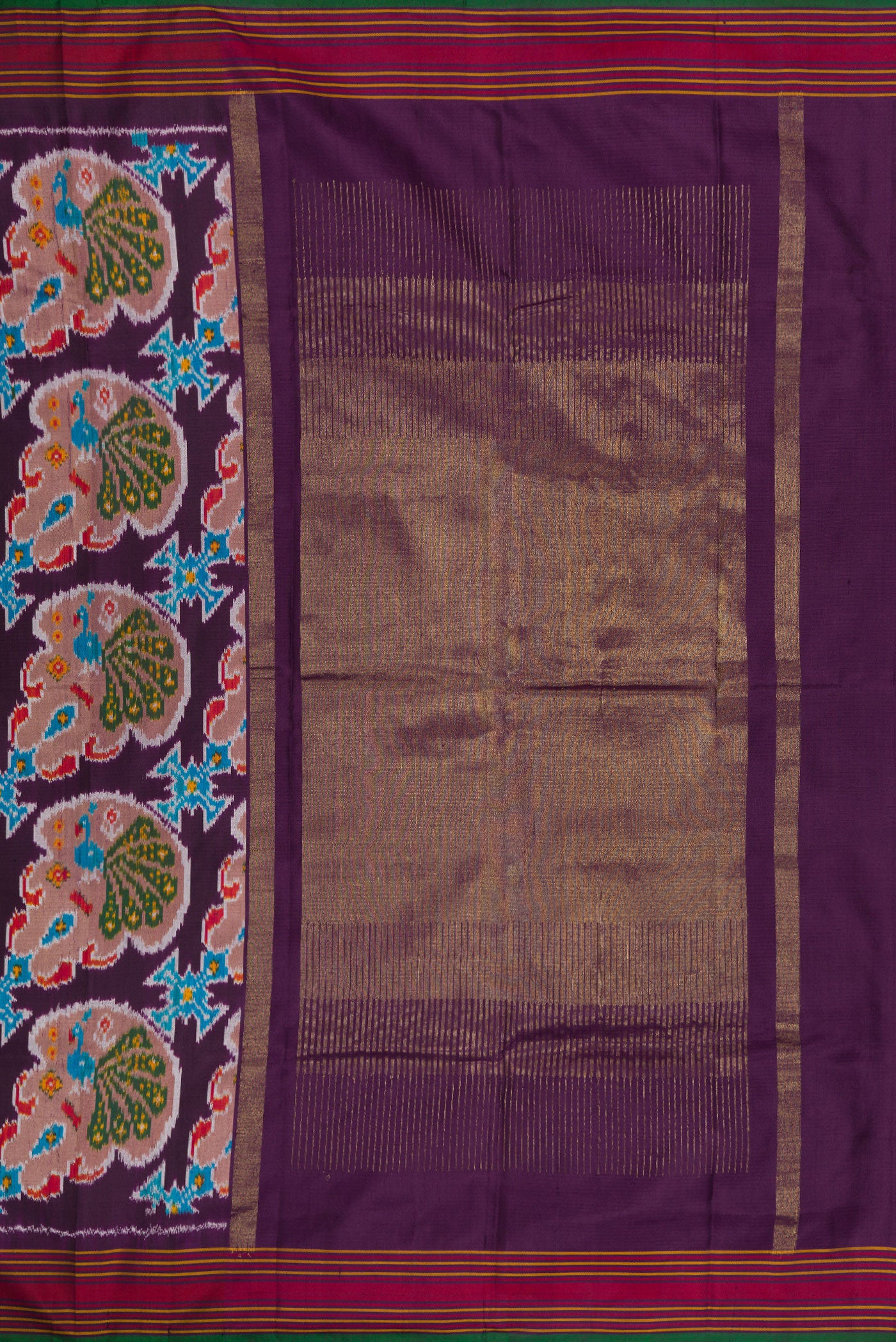 Close up image of the pallu of Burgundy Dual Tone Double Ikat Saree with Ikat Print on the body and Thread Border. 