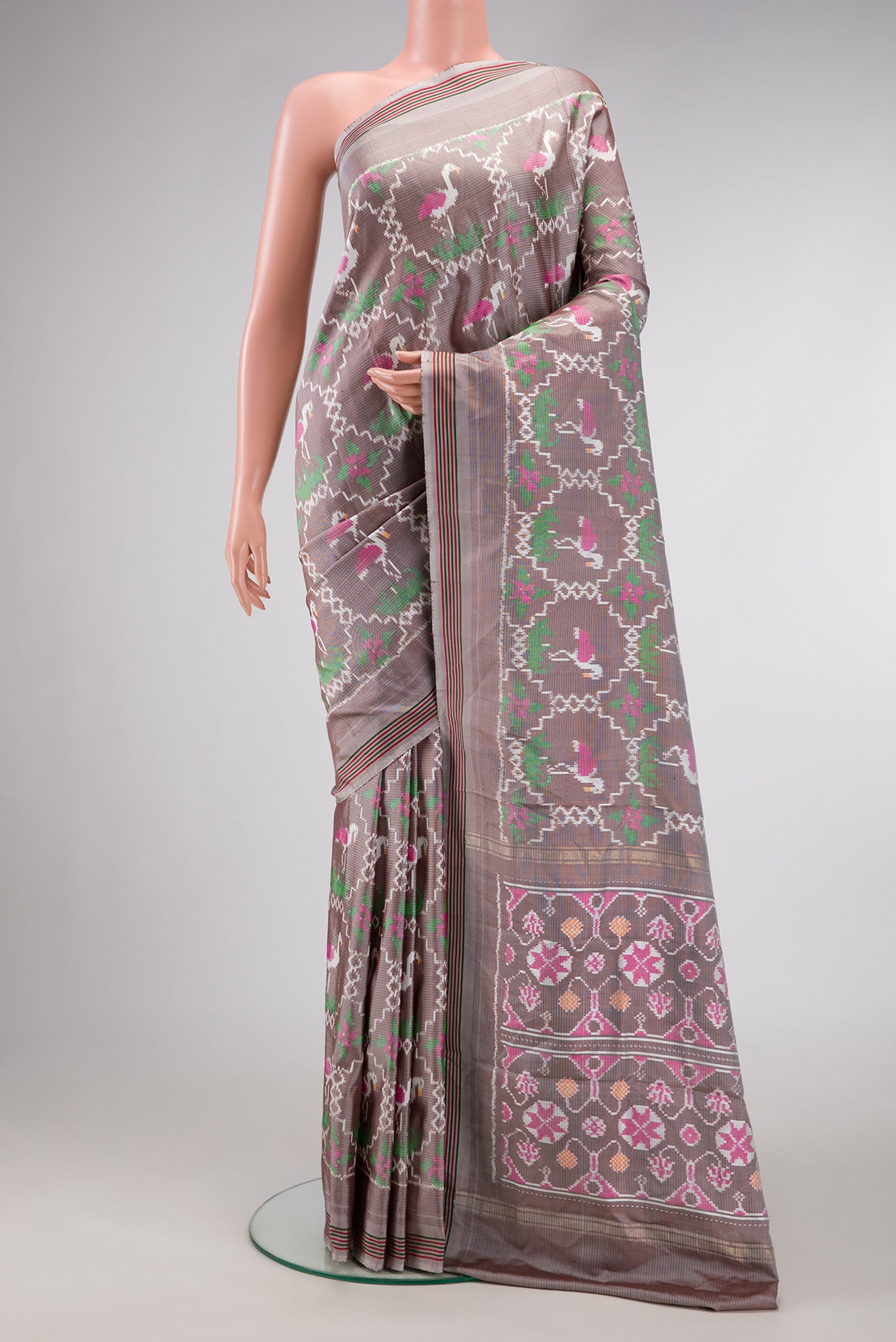 Grey Dual Tone Double Ikat Saree with Ikat Print on the body and Thread Border.  displayed on a mannequin