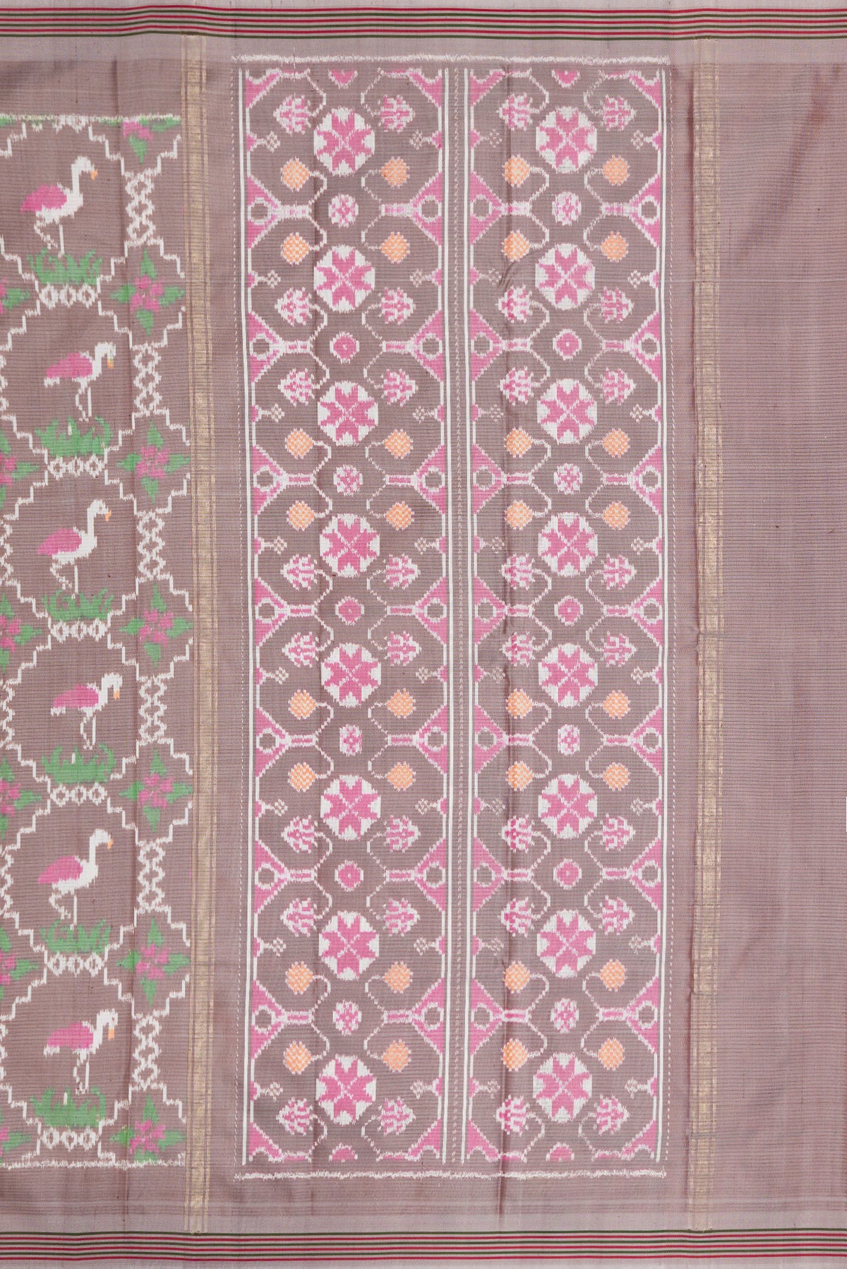 Close up image of the pallu of Grey Dual Tone Double Ikat Saree with Ikat Print on the body and Thread Border. 