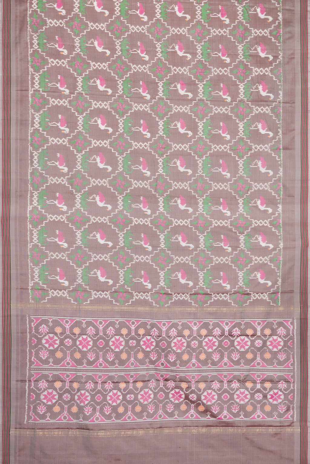 Flat view of Grey Dual Tone Double Ikat Saree with Ikat Print on the body and Thread Border. 