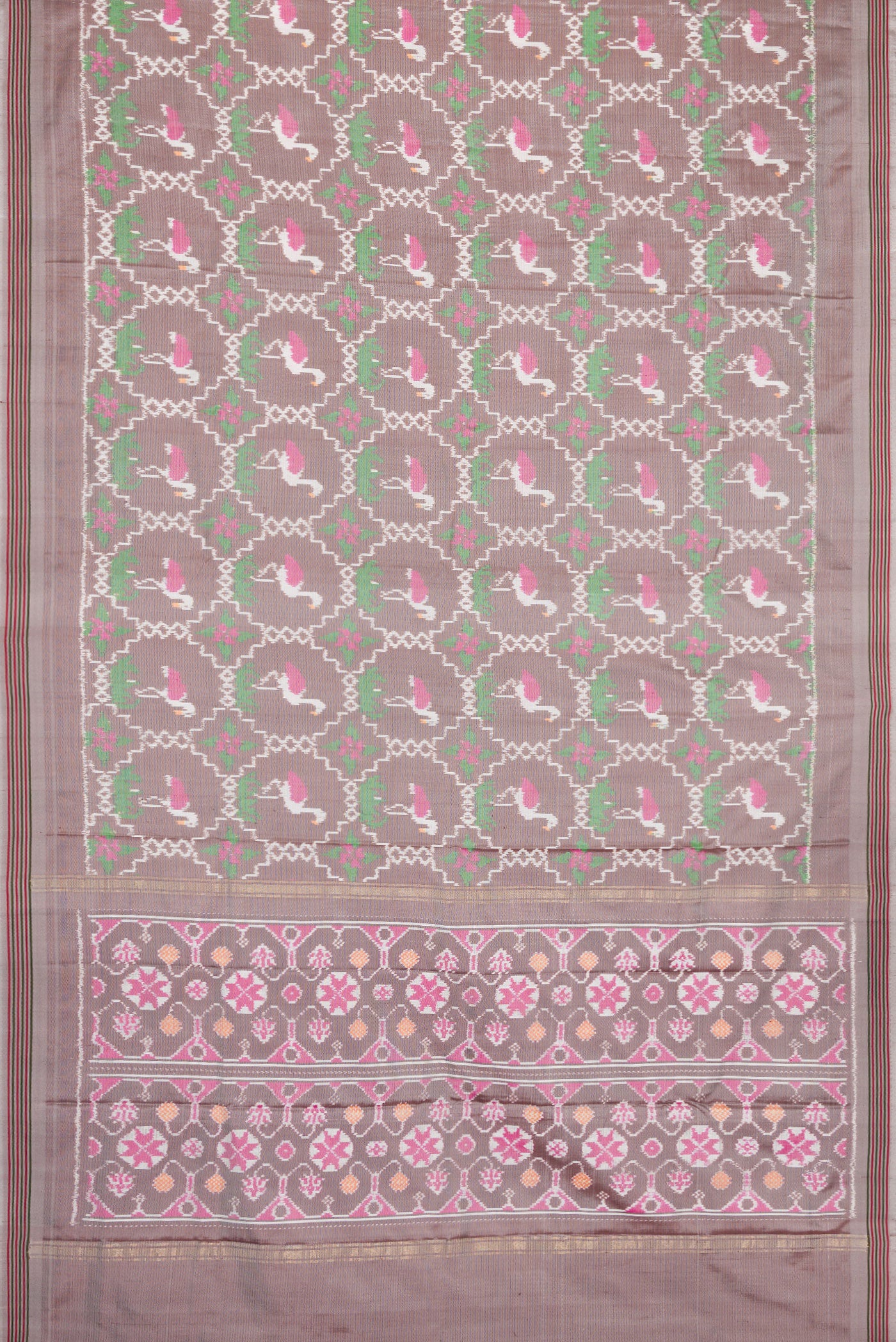 Flat view of Grey Dual Tone Double Ikat Saree with Ikat Print on the body and Thread Border. 