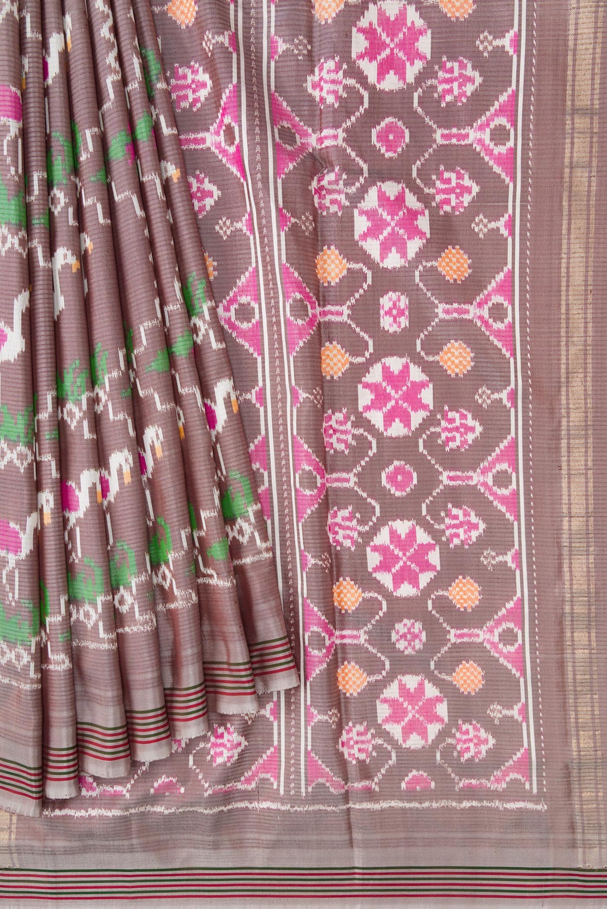 Pleats and pallu of Grey Dual Tone Double Ikat Saree with Ikat Print on the body and Thread Border. 