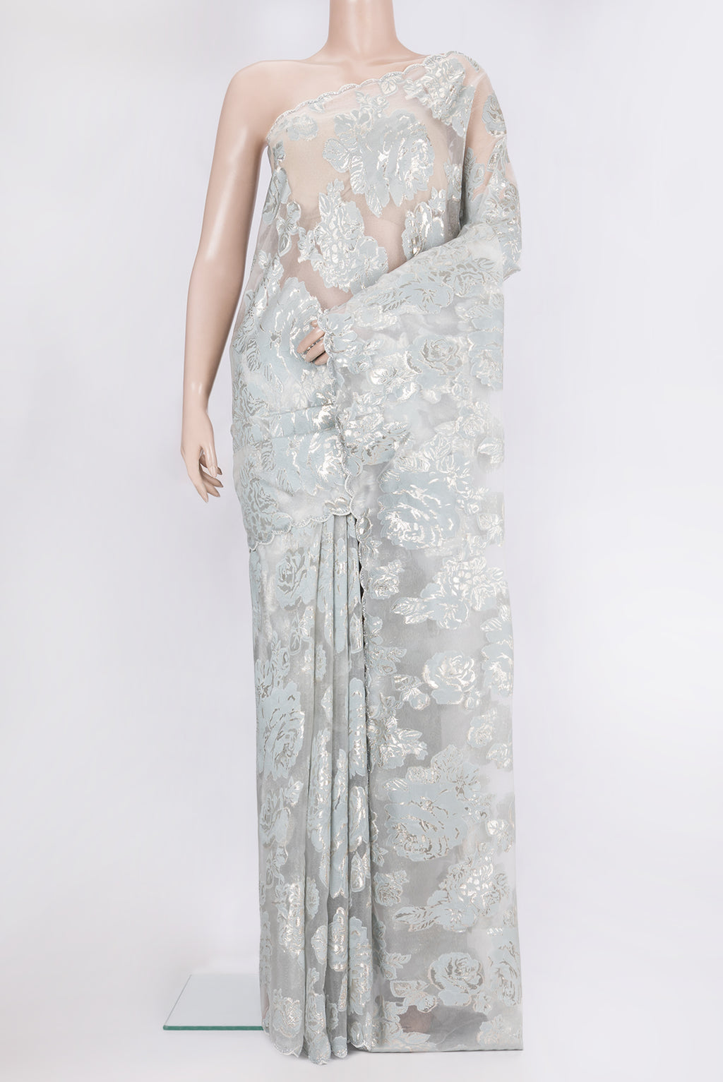 Blue Grey Dual Tone Organza Saree with Embroidery on the body and Embroidery Border.  displayed on a mannequin