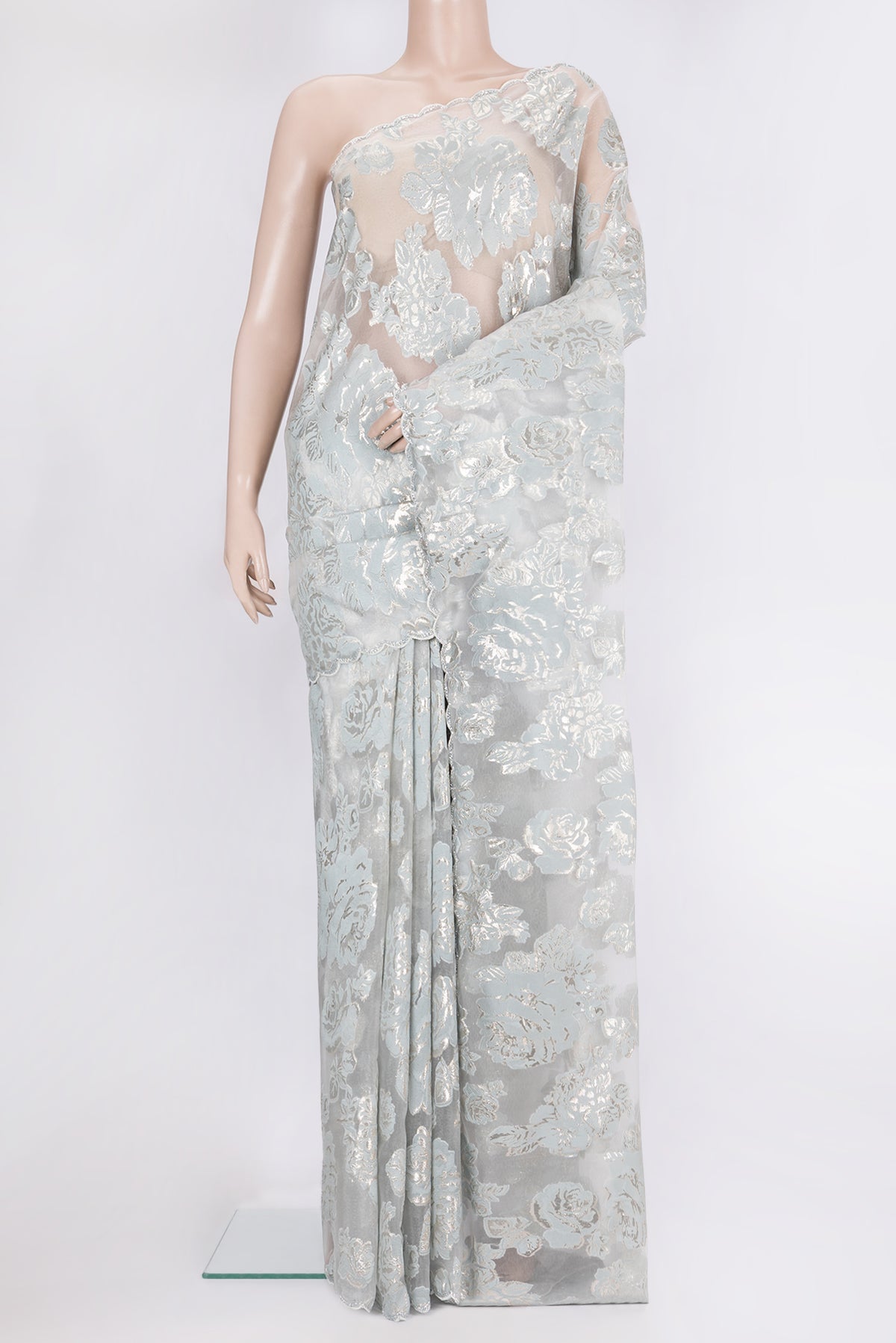 Blue Grey Dual Tone Organza Saree with Embroidery on the body and Embroidery Border.  displayed on a mannequin