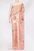 Golden Peach Organza Silk Saree with Floral Print on the body and Satin Border.  displayed on a mannequin