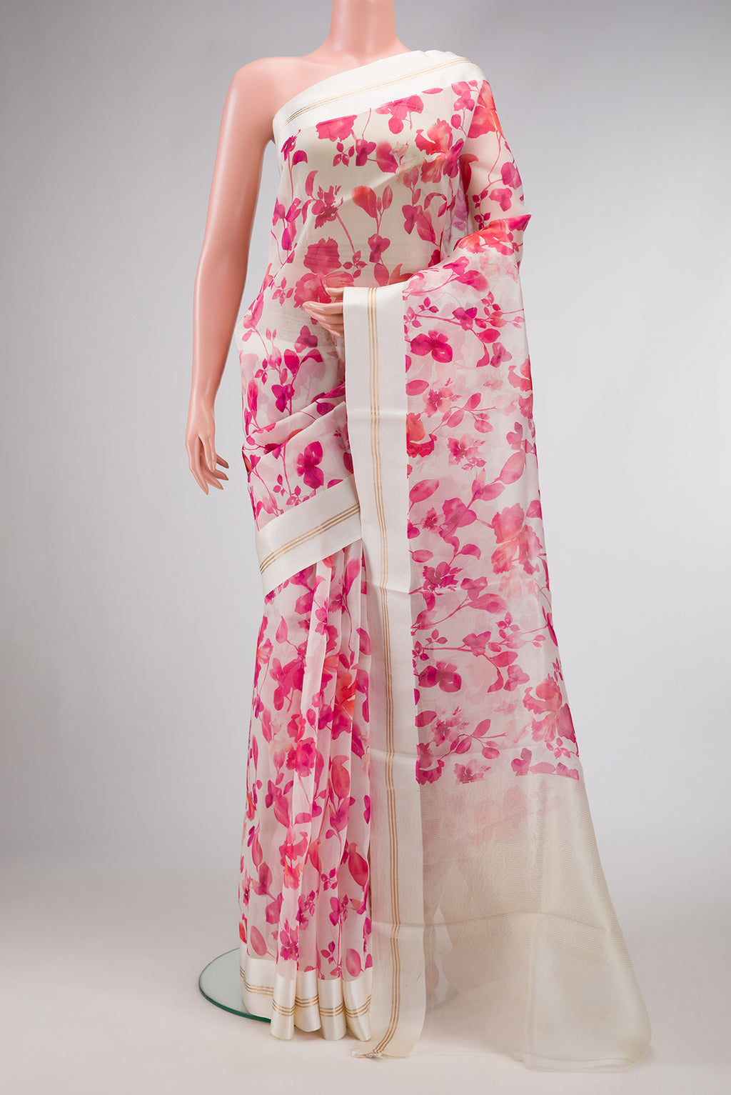 Beige Dual Tone Organza Silk Saree with Printed design on the body and Zari And Thread Border.  displayed on a mannequin
