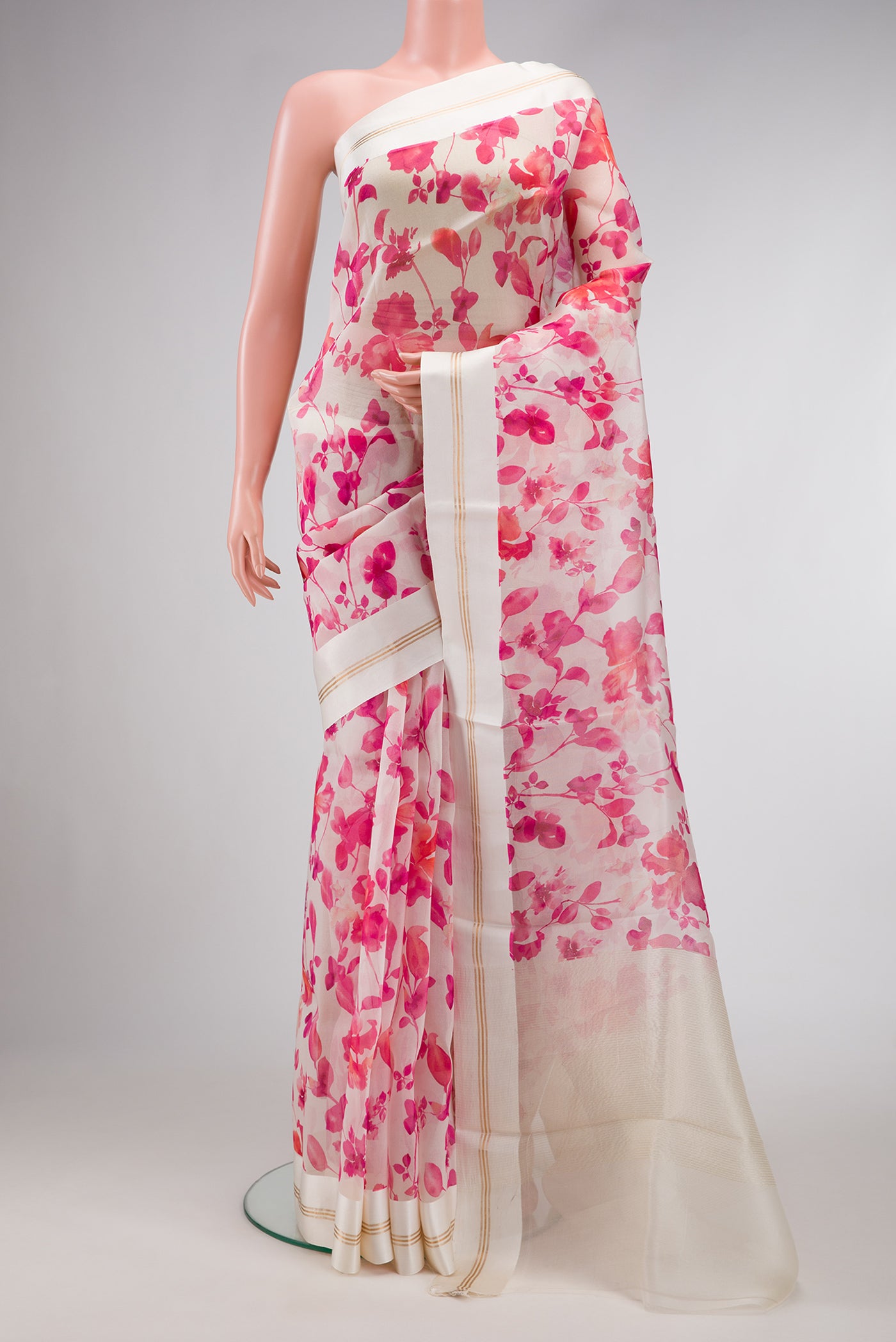 Beige Dual Tone Organza Silk Saree with Printed design on the body and Zari And Thread Border.  displayed on a mannequin