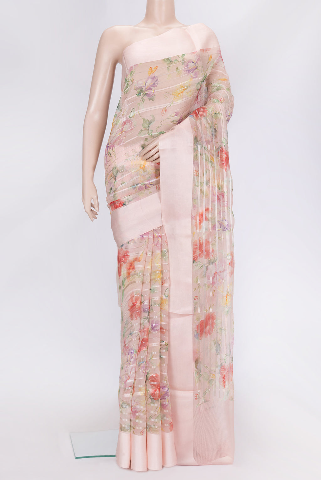 Rose Gold Dual Tone Organza Silk Saree with Stripes on the body and Thread Border.  displayed on a mannequin