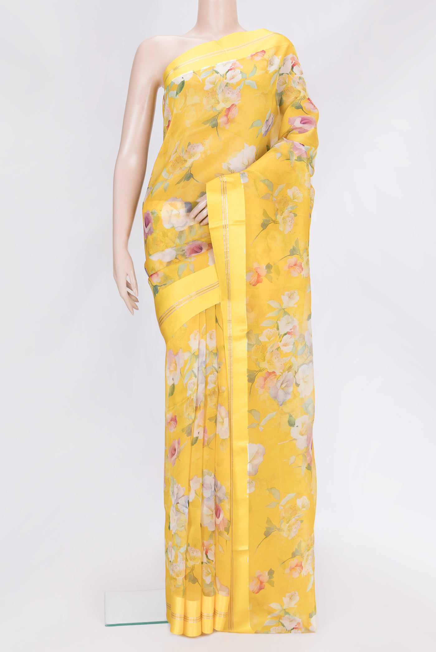Yellow Dual Tone Organza Silk Saree with Printed design on the body and Zari Border.  displayed on a mannequin