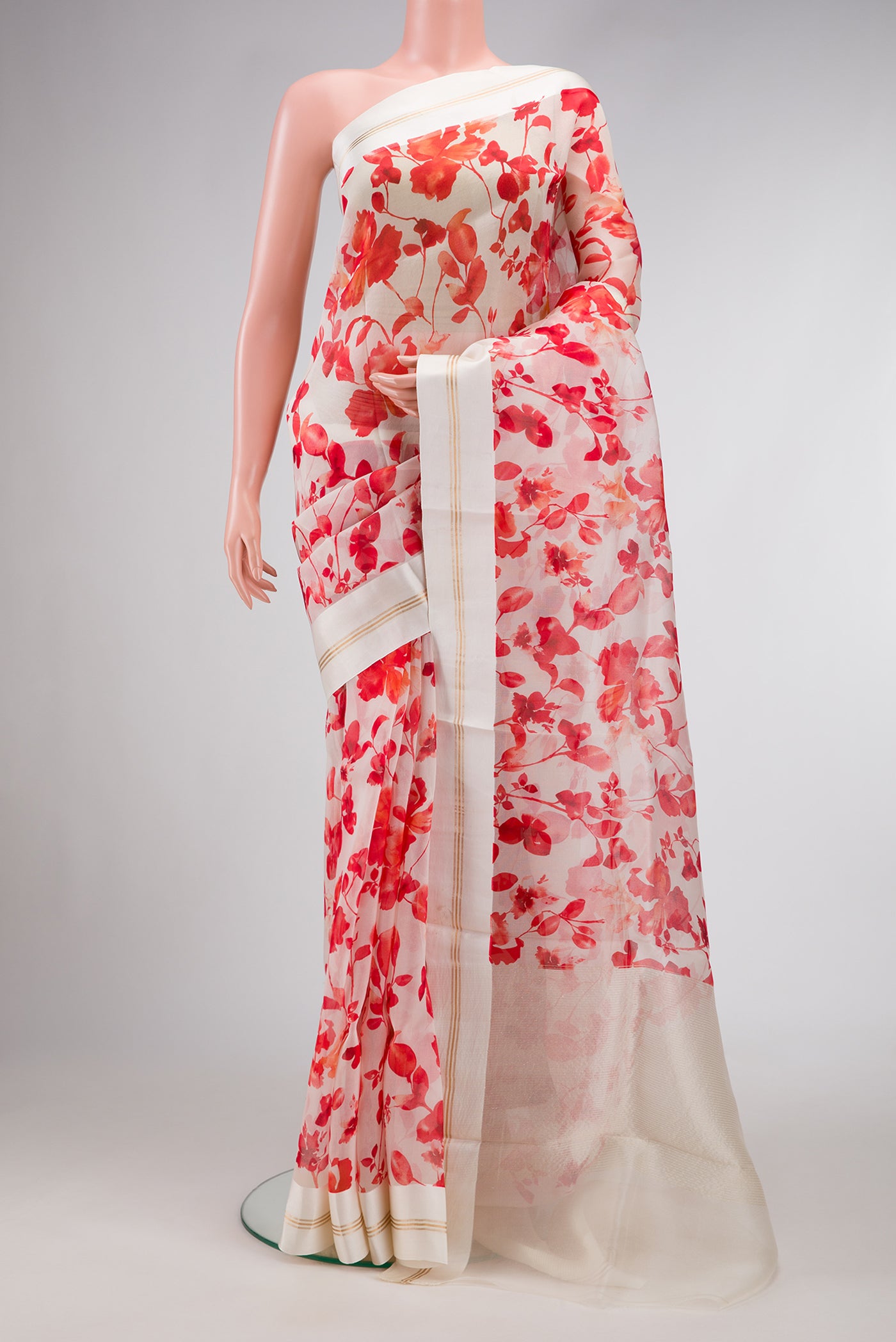 Beige Dual Tone Organza Silk Saree with Printed design on the body and Zari And Thread Border.  displayed on a mannequin