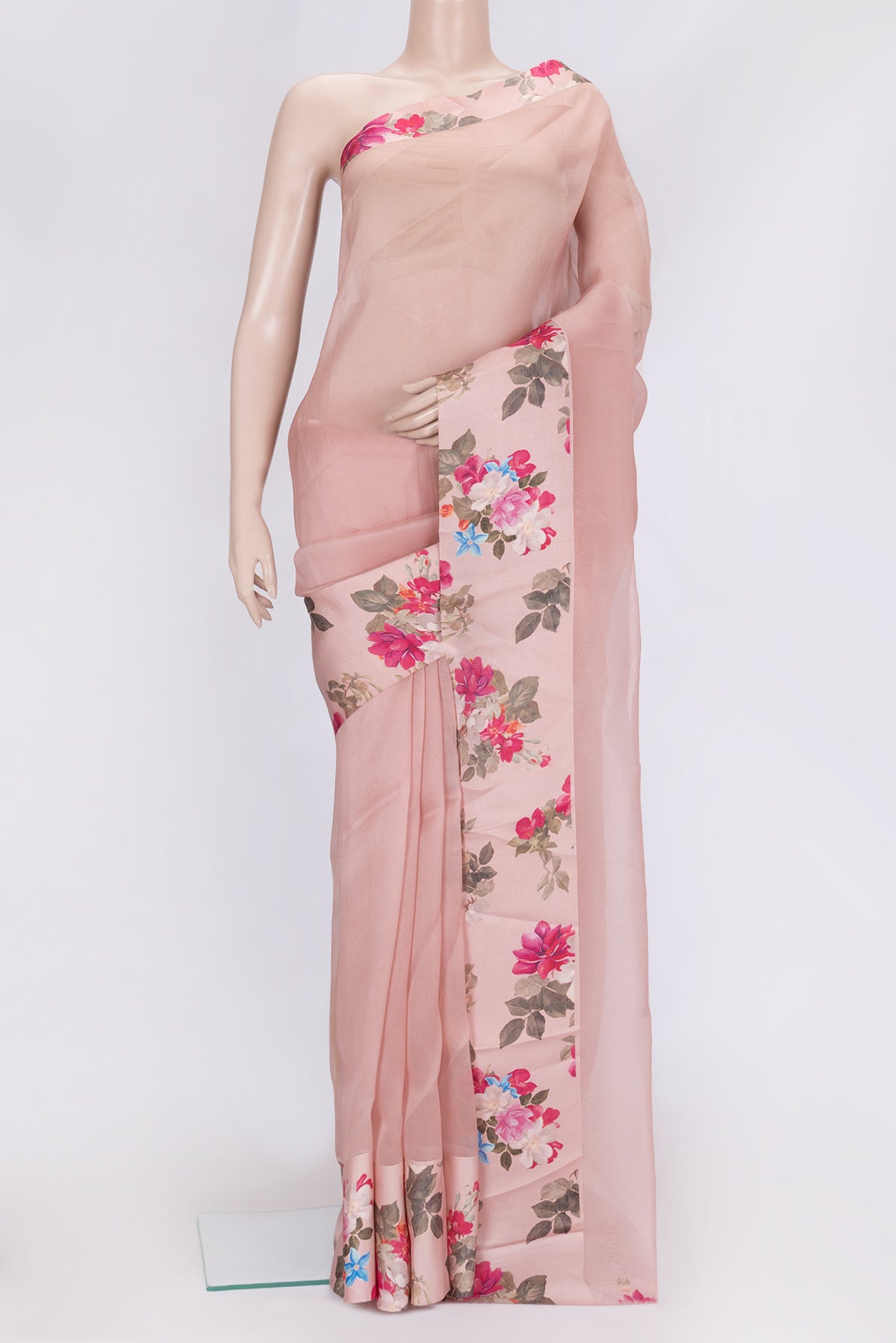 Rose Gold Dual Tone Organza Silk Saree with Plain Body and Printed Border.  displayed on a mannequin