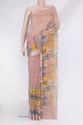 Rose Gold Organza Silk Saree with Zari Butta on the body and Fancy Border.  displayed on a mannequin