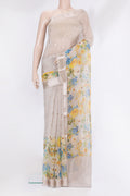 Beige Organza Silk Saree with Zari Butta on the body and Fancy Border.  displayed on a mannequin