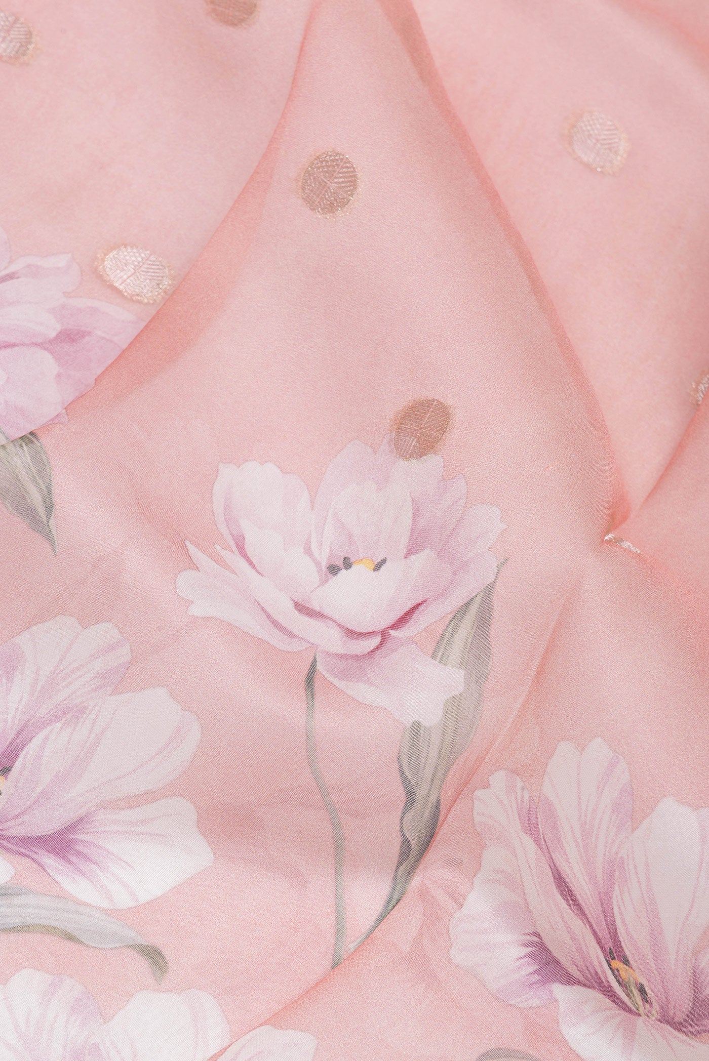 Close up of Pink Organza Silk Saree with Zari Butta on the body and Zari Border.  displaying folds
