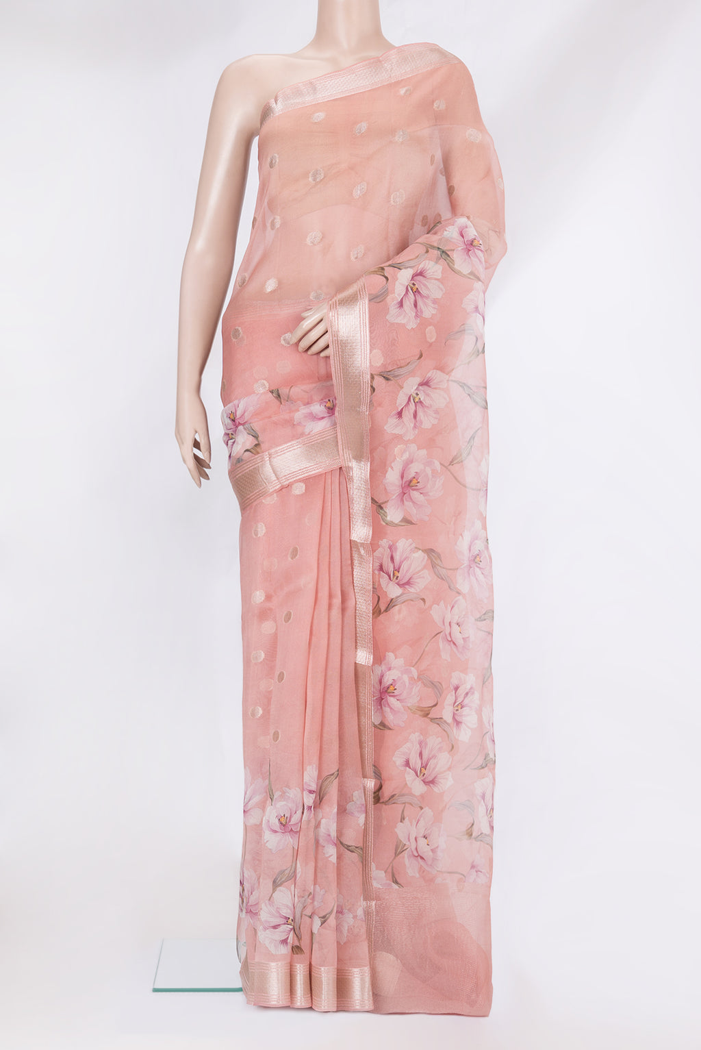 Pink Organza Silk Saree with Zari Butta on the body and Zari Border.  displayed on a mannequin