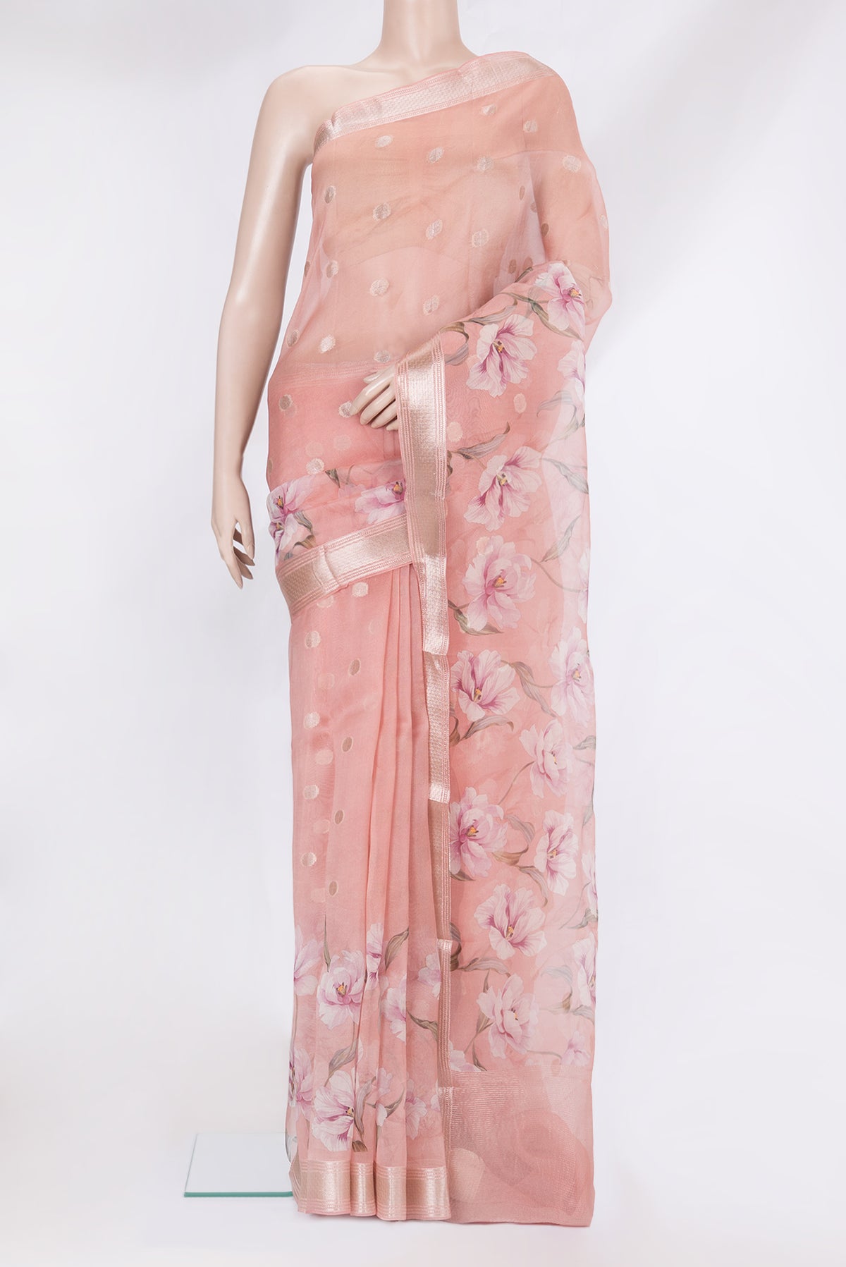 Pink Organza Silk Saree with Zari Butta on the body and Zari Border.  displayed on a mannequin